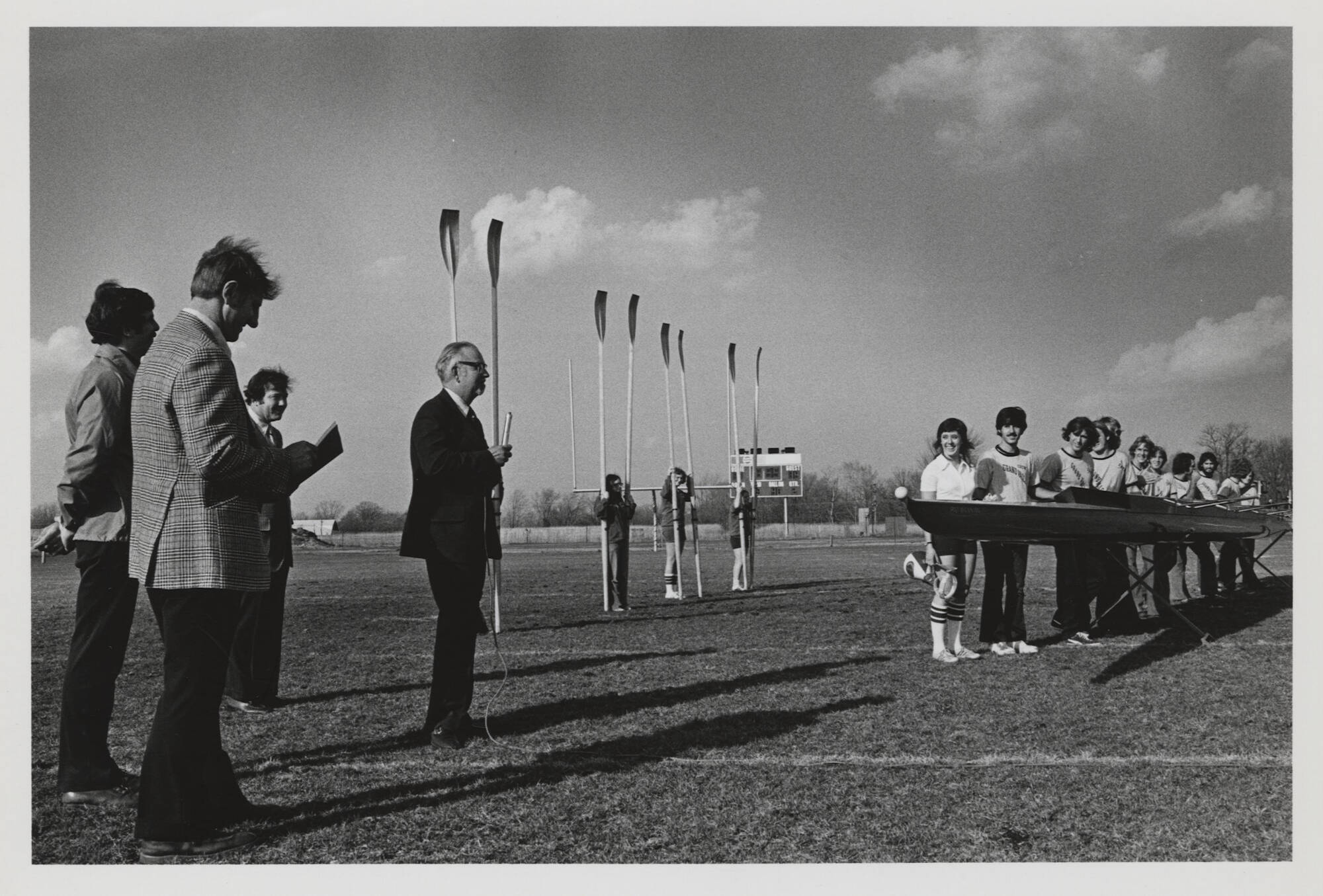 Members of the rowing team dedicate a new shell in the 1960s